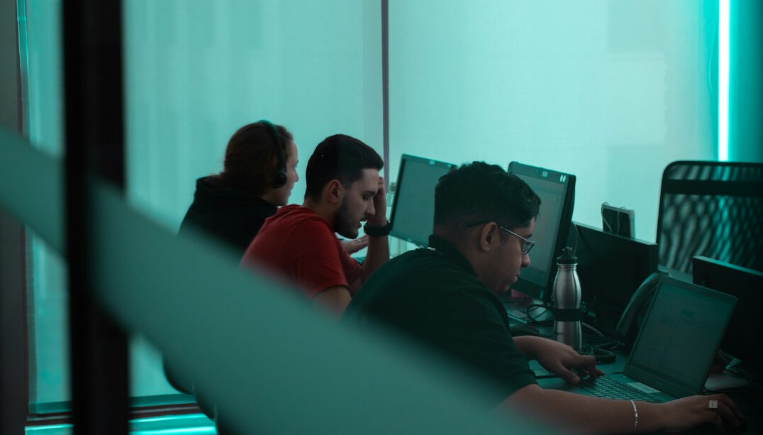 team of programmers in office