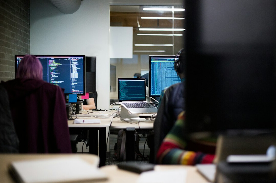 programmers coding together