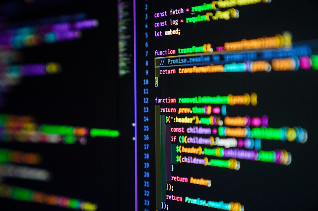 software developer coding on computer